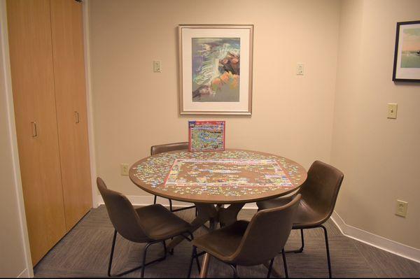 Puzzle table within the waiting room.