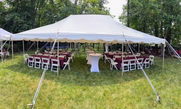 20x30 pole tent, perfect for events with 50-60 guests. Great for weddings, parties, and outdoor gatherings. Ideal for a comfortable, shaded