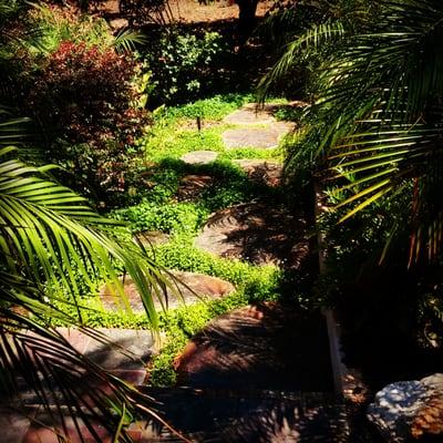 Mike designed these stamped concrete septic tank covers as part of a path through our garden. Very creative!