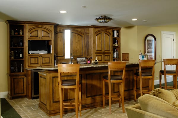 Finished basement and added entertainment bar.