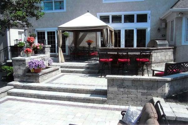 Design and custom stonework - outdoor entertainment area by Daniels Landscaping