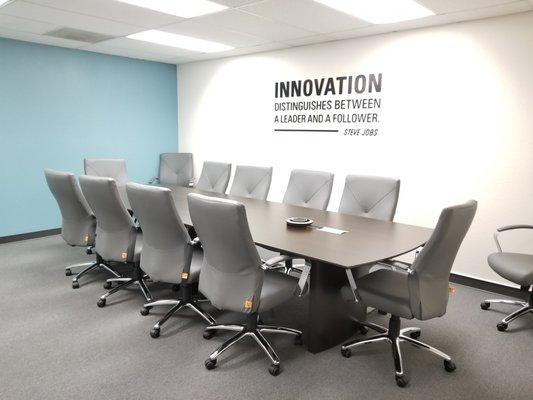 Shared conference room for tenants and individuals renting it on a per-use basis.