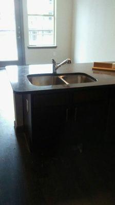 Istall new island kitchen sinks.