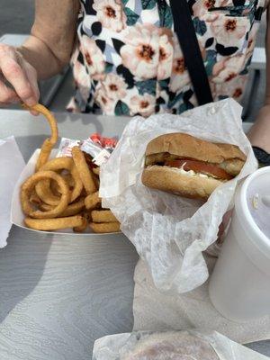 Grilled Chicken sandwich with onion ring basket and tea