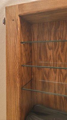 Cabinet interior with the glass shelf