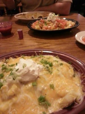 Chicken enchiladas,  sea food baked potato and chicken fried steak baked potato!  I'm already loving this place!