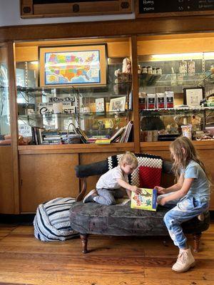 The most precious children behaving at the coffee shop