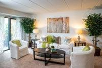 Large living room is connected to the dining room in an open floor plan.