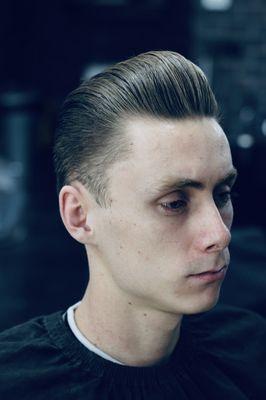 Blow dried and styled With a light amount of water based pomade.