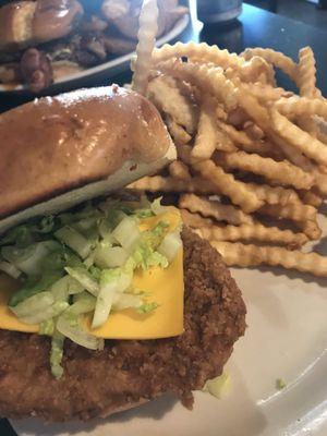 Pork Tenderloin with cheese, lettuce, mayo. Side of fries.