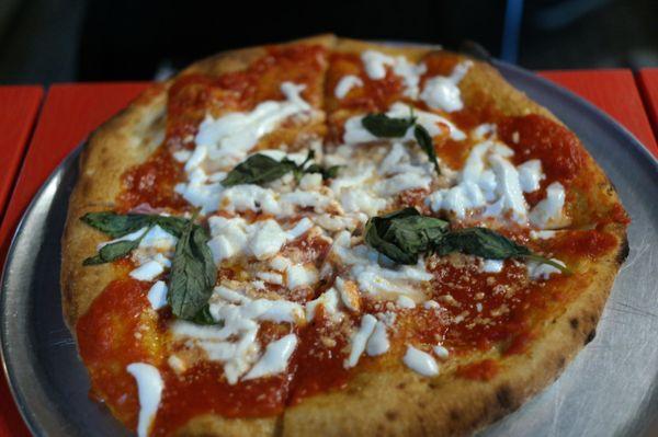 Montanara - Fried pizza crust, red sauce, mozzarella and basil.