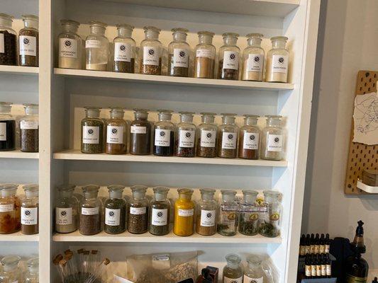 amazing amount of jars filled with herbs both domestic and international