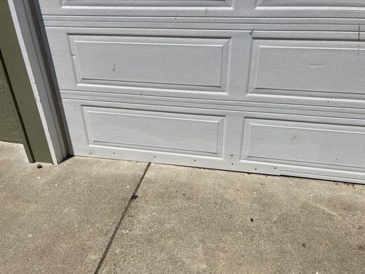 Grade in Concrete leaves a gap for rodents to squeeze into garage. Permanent solution solves the problem.