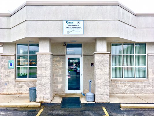 Front entrance and handicap-cap parking