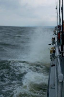 Hauling it back to port to avoid getting caught in the storm.