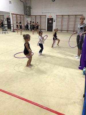 Beginners learning hoop skills