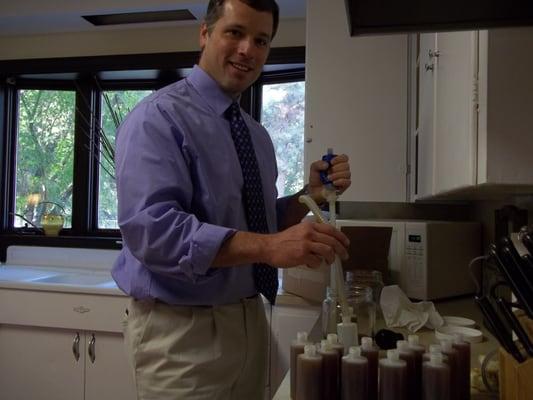 Tony Burris, L.Ac. of Eagle Acupuncture Making His Herbal Liniment