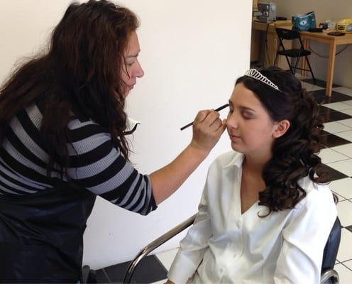 Rosa applying make up for my daughter's quinceanera.