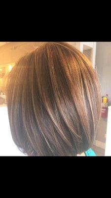 Copper and brown Highlights /lowlights with a razor bob.