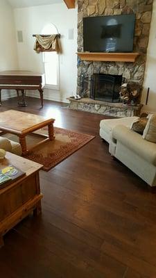 Hardwood replacing carpet brings luxury to the family room. Novelty, OH