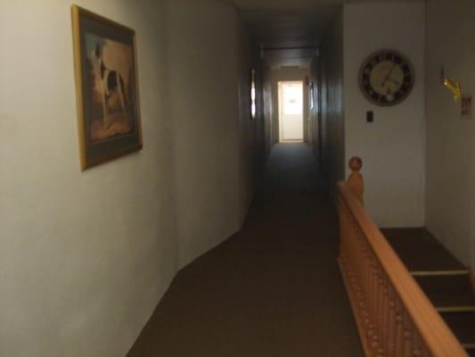 This is the hallway upstairs leading to the 6 apartments at the Goodrich. Security cameras in place. All apartments are different.