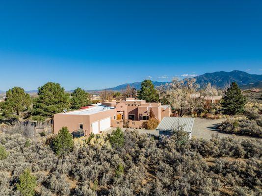 Adobe style home in Taos, NM, listing by Chisum Realty Group, Taos Real Estate experts!