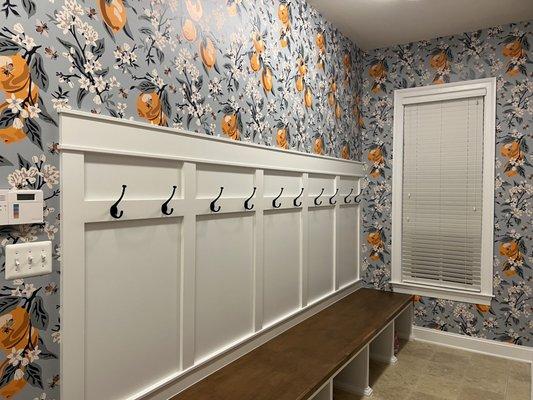 Whimsical wallpapered mudroom