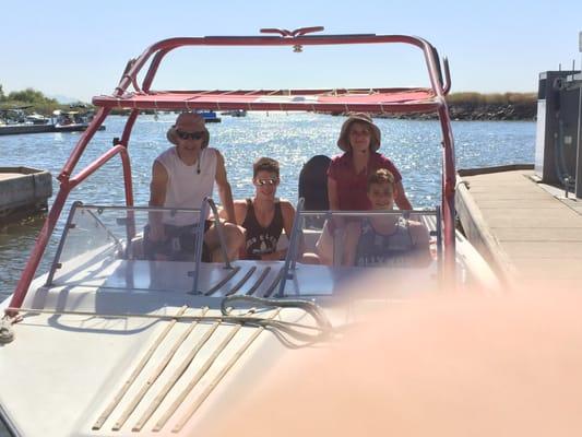 The A-C family in a ski boat on the Delta.