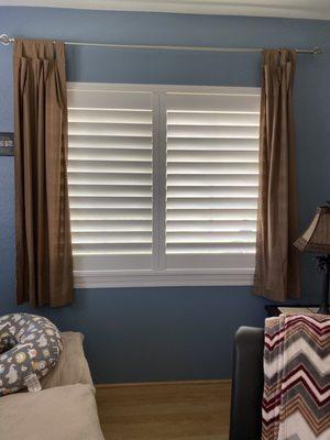 Plantation shutters installed in living room