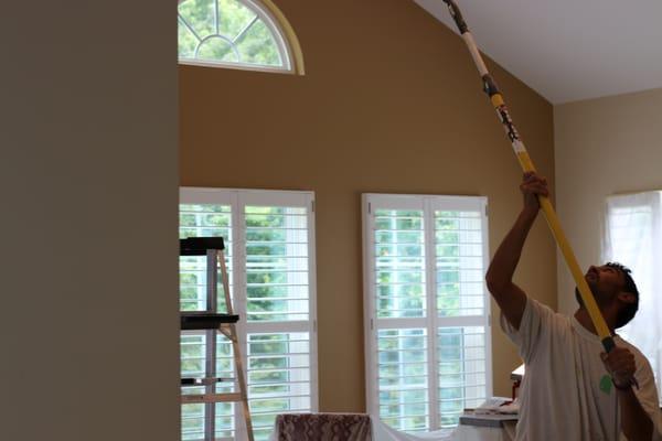 Lead painter Abel finishing up a quality interior paint project