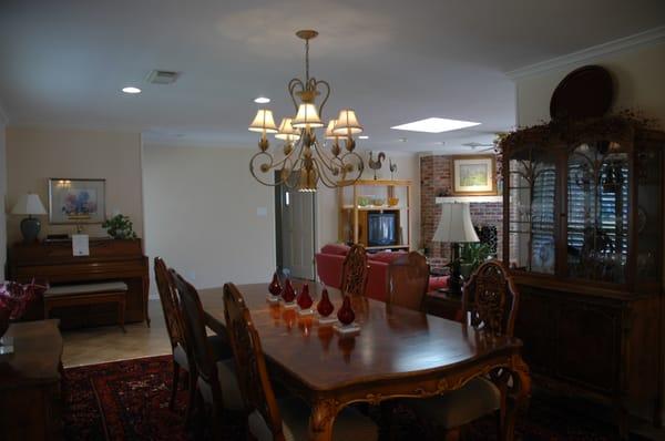 WE TOOK OUT A LOAD-BEARING WALL AND OPENED UP THE DINING ROOM INTO THE LIVING AREA.