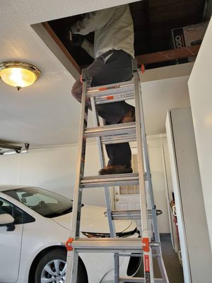 Abraham working on our garage attic