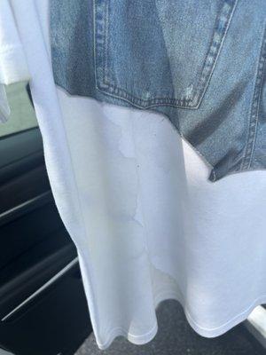 Stains on the front of the shirt that the owner said wear as "a cool design", ABSOLUTELY NOT!!