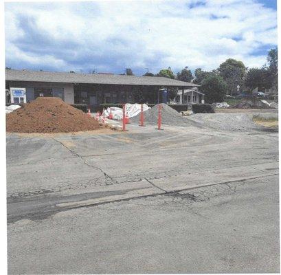 ADA Violation.  Dirt in Handicap Parking Space.