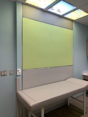 Procedure room with lighting elements that entertain children. Love the attention to details.