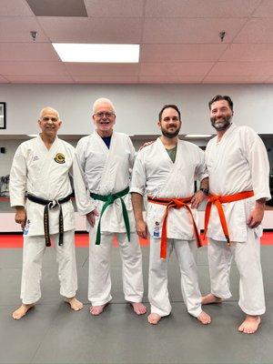 Adult class just received their new belts.