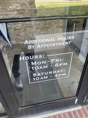 Business front door and hours