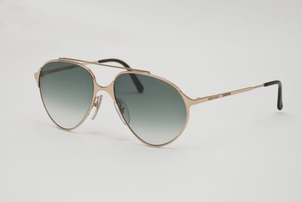 Noel Rich Boutique exclusive Boeing Carrera collaboration. Gradient emerald lens striking gold aviators.