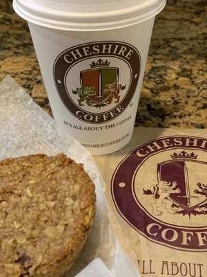 Gluten-free peanut butter muffin with chocolate chips coupled with a delicious latte. Happy town!