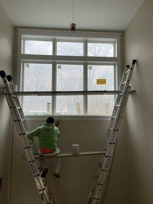 Painting tall foyer