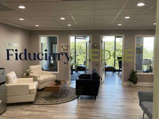 Welcome to our office lobby - coffee or tea? Views of gold dome and Johnson Square.