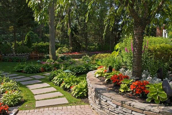 Expert design and installation of stone patios, walkways and retaining walls are a Country Lawn & Landscape signature service.