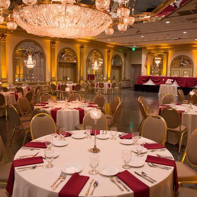 Wedding set up with ivory and burgundy decor options. We offer our clients the choice of over 50 colors of linens to choose from.