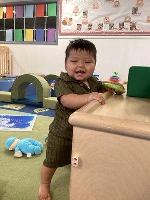 Happy baby! He loves to play with toys and crawl everywhere and he has the space to do that