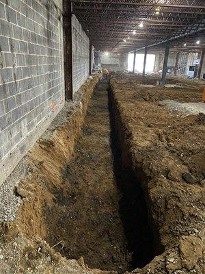 Trenching for underground utilities.