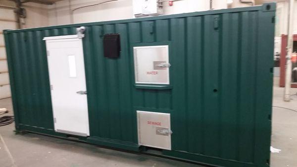 20' Conex - self contained lavatory w/mens and ladies bathrooms