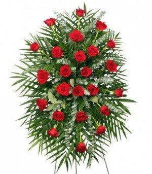 RED ROSES STANDING SPRAY
OF FUNERAL FLOWERS
Classic, fresh-cut red roses with accents of eucalyptus and other fresh foliage a...