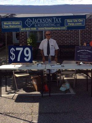 One of our employees at a fair in Conway.