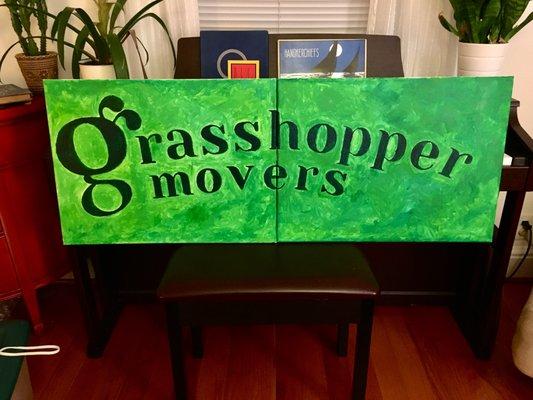 Hand-painted artisanal Grasshopper sign for Fox5 event with DC Diaper Bank