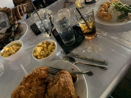 Yard bird (fried chicken), mac and cheese , fried shrimp , mashed potatoes, green beans, Grilled Black Angus Ribeye.